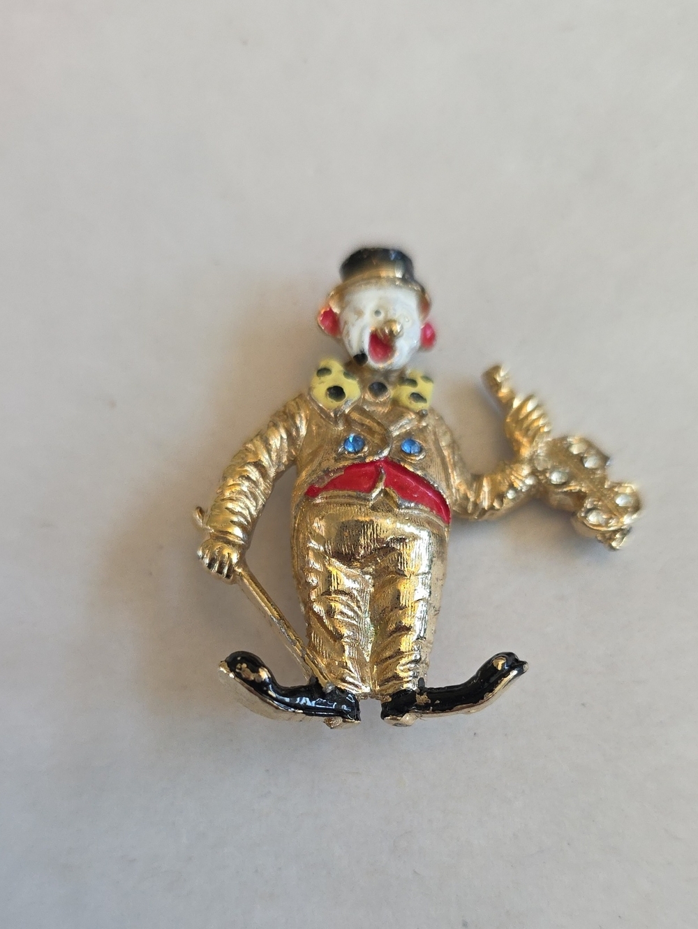 Playful Gold-Tone Clown Brooch with Red and Black Enamel Accents